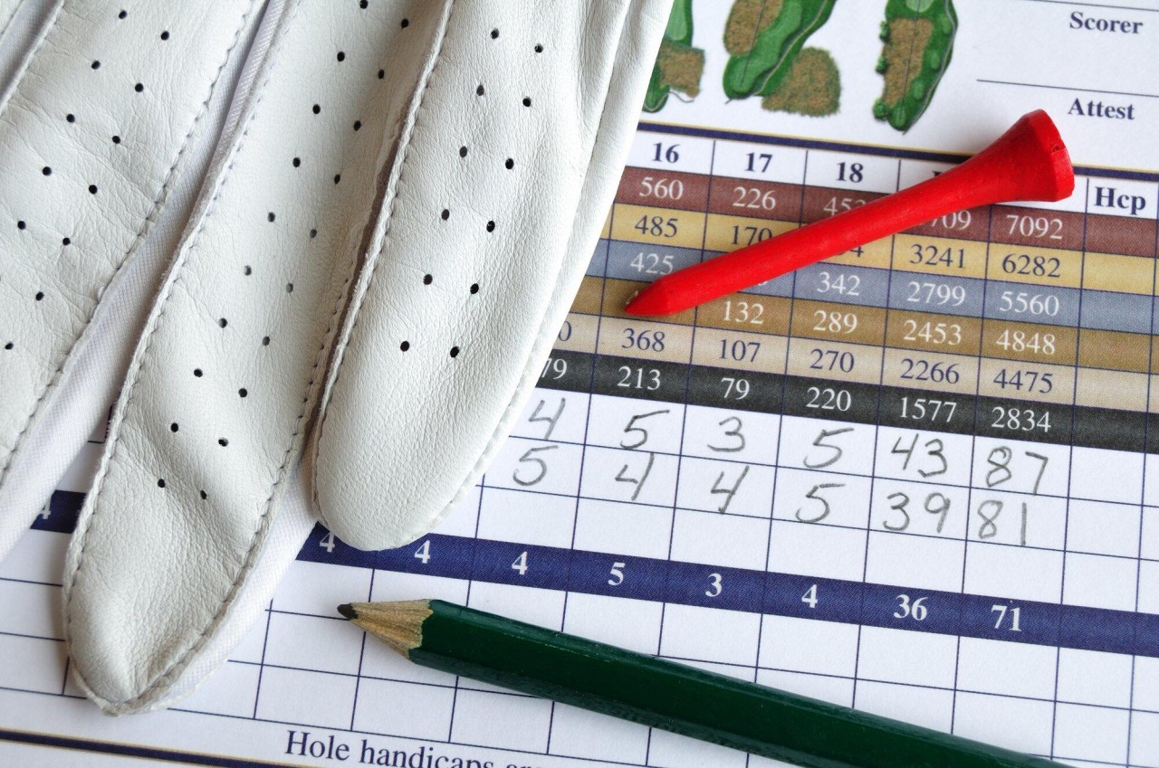 golf-score-card-with-glove-pencil